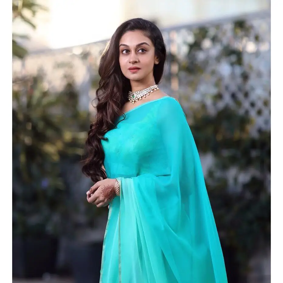 indian actress aishwarya arjun in traditional blue saree sleeveless blouse